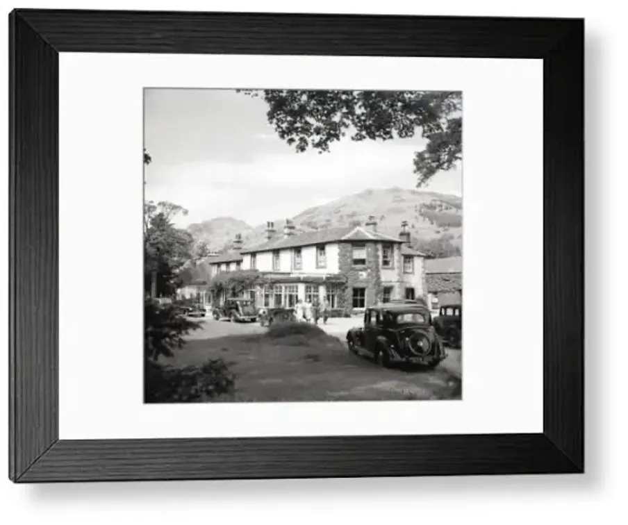 The Scafell Hotel in the mid-20th century, with vintage cars on the drive